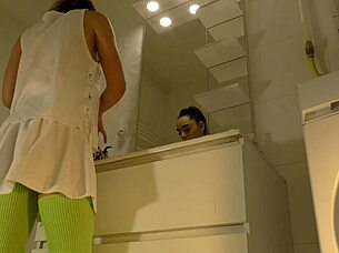 Hot brunette college girl flashes panties under mini tennis skirt in bathroom.