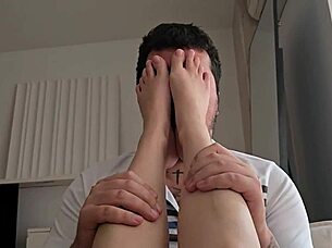 Hey, this fetish guy chokes while sucking and licking her feet for intense footjob and handjob