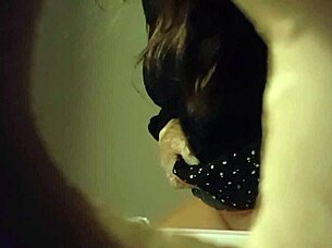 Hidden Cam Captures Sexy Babe Peeing in Toilet