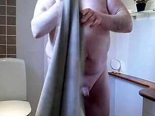 chris enjoys a relaxing solo shower with warm water cascading down