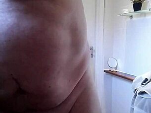 chris enjoys a relaxing solo shower with warm water cascading down