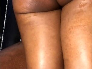 In the bedroom, this ebony girlfriend gets a thigh fuck with intense handjob and fingering. She screams from the passionate amateur action on the bed.