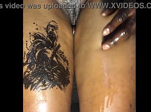 In the bedroom, this ebony girlfriend gets a thigh fuck with intense handjob and fingering. She screams from the passionate amateur action on the bed.