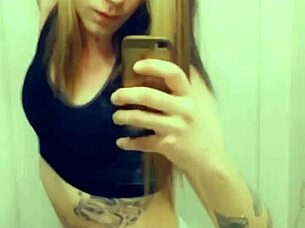 hot tranny in satin lingerie touches her small cock and clit seductively