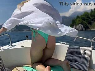 riding topless on boat taxi surprises driver with flashing