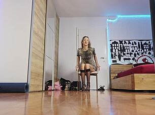 Glamorous blonde in short hair struts high heels