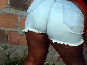 Big ass neighbor cleans the yard in casual morning routine