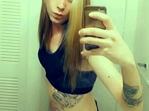 hot tranny in satin lingerie touches her small cock and clit seductively