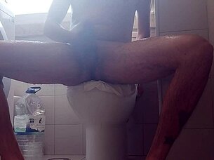 This guy was shaving his monster cock when he suddenly spit out a ton of milk everywhere