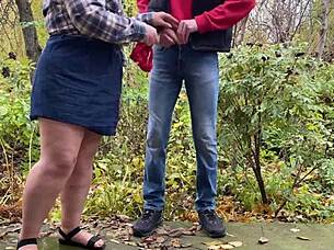 mature woman in lingerie teases with her curvy belly and legs to draw attention