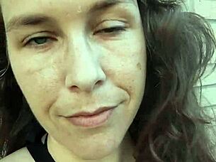 Kelly Kendricks Smokes Cigarettes In The Sun With Lots Of Cleavage