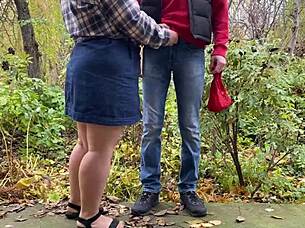 mature woman in lingerie teases with her curvy belly and legs to draw attention