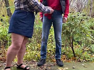 mature woman in lingerie teases with her curvy belly and legs to draw attention