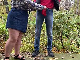 mature woman in lingerie teases with her curvy belly and legs to draw attention