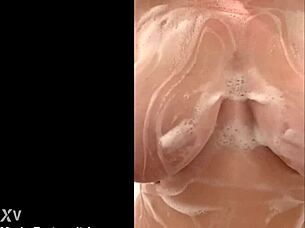 hey, watch this chubby french milf caress her big tits secretly in the shower!