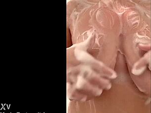 hey, watch this chubby french milf caress her big tits secretly in the shower!