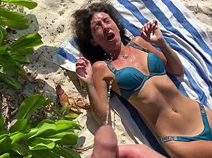 pissing on skinny babe at public beach, she gets shocked with wet pussy fetish 😲🏖️