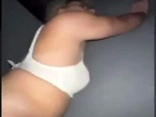 The blonde appears in a simple scene.