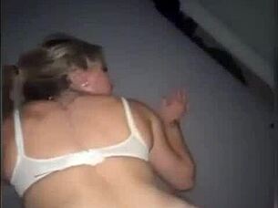 The blonde appears in a simple scene.