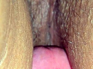 A close-up view shows a Latina wife with a visible mark on her intimate area.