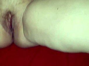 She experiences a solo orgasm, building up to intense cumming in a private moment.