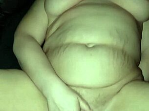 She experiences a solo orgasm, building up to intense cumming in a private moment.