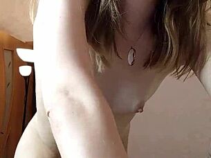 A beautiful woman dances and plays for the camera in a solo webcam session.