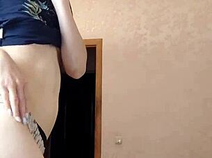 A beautiful woman dances and plays for the camera in a solo webcam session.