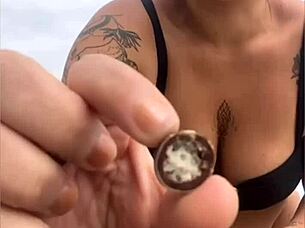 Wearing A Tight Yellow Bikini That Splits The Pussy To Attract Attention On The Beach