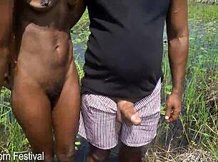 Whoa, Watch This Skinny African Beauty Stroke A Tourist Hard In The River!