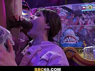 She explored a thrilling BBC encounter at the arcades with her shaved brunette body in hardcore action.