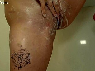 Curvy brunette alexa black teases with huge tits before sliding long dildo deep into her wet shaved pussy and tight asshole for intense solo anal play in bathroom.