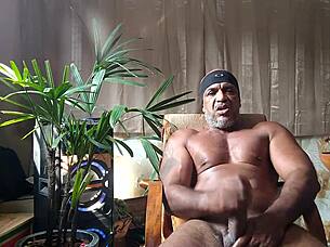 hey, watch brazilian pornstar kojac stroke his hairy monster cock solo