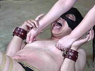 Japanese Mistress Pulls Nipples with Clamps