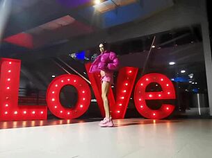 transsexual crossdresser exhibits skimpy skirt flashing panties seductively