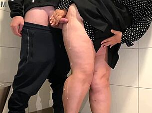 juicy milf strokes cock public toilet