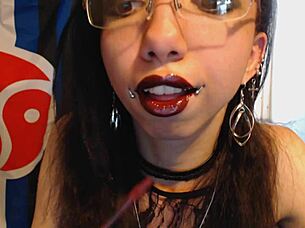 young goth teases huge puffy nipples with red lipstick