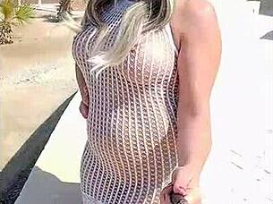 blonde flashes big tits in transparent dress outdoors