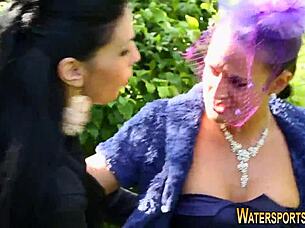 lesbian goldenshower fingering toys outdoors in stockings