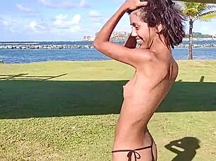 Skinny latina strips teases flashes at public beach