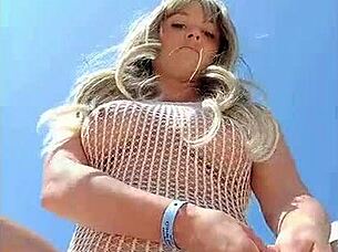 blonde flashes big tits in transparent dress outdoors