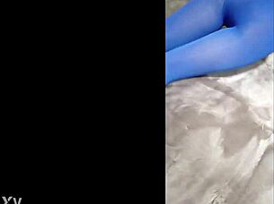 she struts in sexy pantyhose and blue high heels teasingly