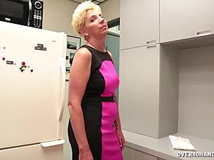 milf gives naked handjob to throbbing cock