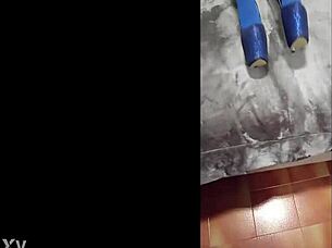 she struts in sexy pantyhose and blue high heels teasingly