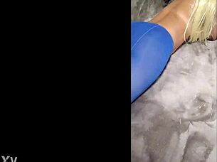 she struts in sexy pantyhose and blue high heels teasingly