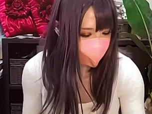 watch this beautiful masked ladyboy masturbate her ass while crossdressing on cam?