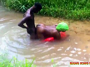 Asian milf rides big black cock to creampie in outdoor public stream