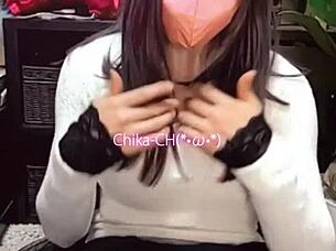 watch this beautiful masked ladyboy masturbate her ass while crossdressing on cam?