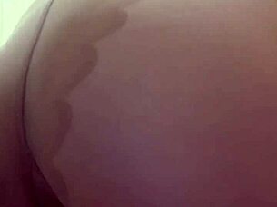 Mistress Elza Koms teases nylon-clad ass dominantly