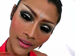 adorable tattooed ladyboy jerkin her huge shecock upclose in fishnets